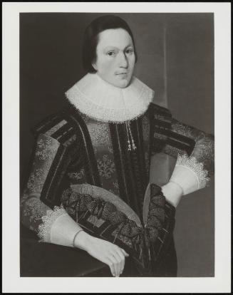 Portrait Of A Young Man, Half-Length Wearing A Black And Gold Doublet With Red Cuffs, And A White Lace Ruff, C 1620-1625