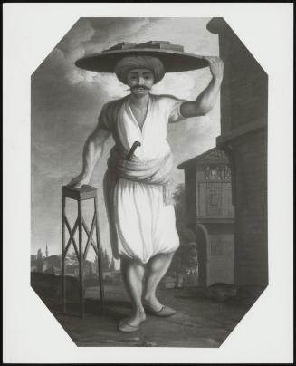 Man Carrying Objects On His Head
