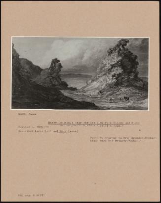 Rocky Landscape Near The Sea With Pack Horses And Rider