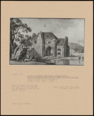 A View of Priory Gatehouse at Dover with a Group of Figures Resting by a Rock in the Foreground