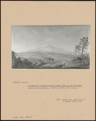 A Traveller In Sicily With Mount Etna In The Distance