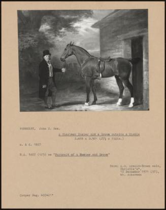 A Chestnut Hunter And A Groom Outside A Stable