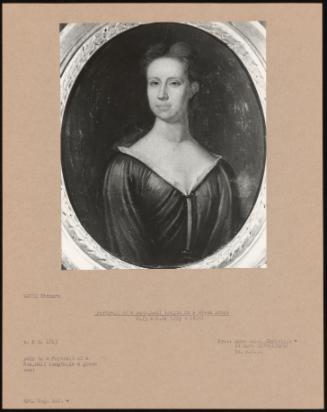 Portrait Of A Lady, Half Length In A Green Dress