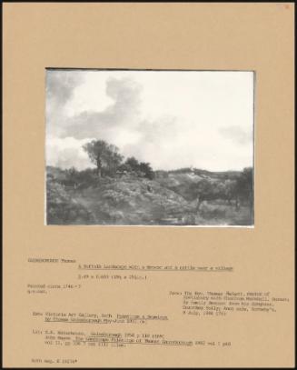 A Suffolk landscape with a drover and a cattle near a village