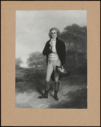 Small Full Length Portrait Of A Young Man Standing In A Landscape Holding A Riding Crop