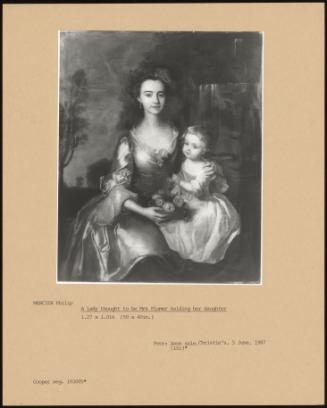 A Lady Thought To Be Mrs Plumer Holding Her Daughter