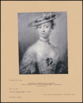 Portrait Of A Lady Wearing A Straw Hat