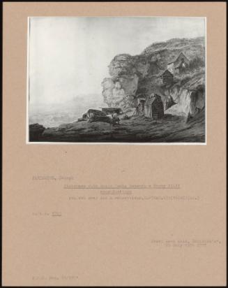 Fishermen With Their Boats Beneath A Rocky Cliff Near Hastings