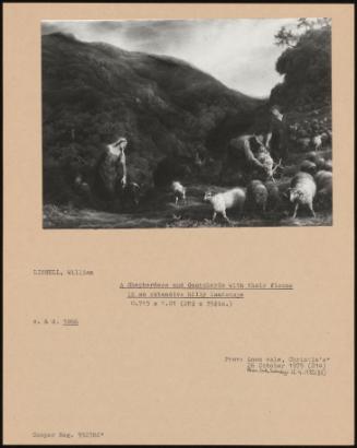 A Shepherd And Goatsherds With Their Flocks In An Extensive Hilly Landscape