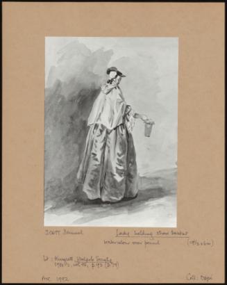 Lady holding a straw basket