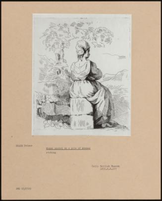 Woman Seated On A Pile Of Stones