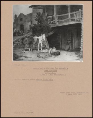 Horses And A Sleeping Dog Outside A Farm Building