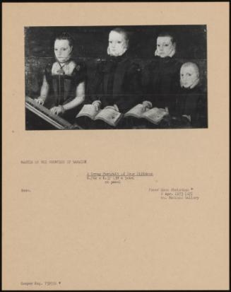 A Group Portrait Of Four Children