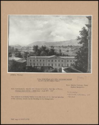 View Of Buildings With Hilly Landscape Beyond