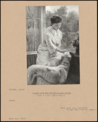 A Lady With Her Dog By An Open Window