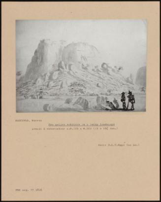 Two Local Soldiers In A Rocky Landscape