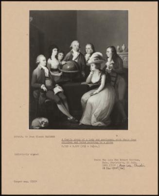 A Family Group Of A Lady And Gentleman, With Their Four Children And Tutor Pointing To A Globe