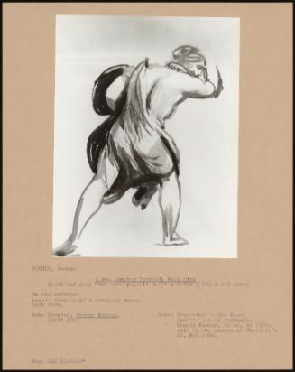 A Man Lunging Forward; Back View