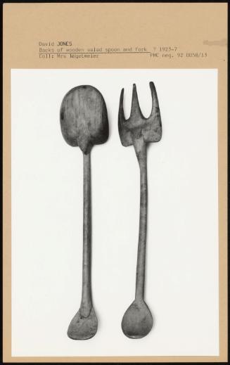 Backs Of Wooden Salad Spoon And Fork