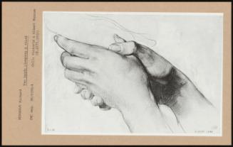 Two Hands Clasping A Third