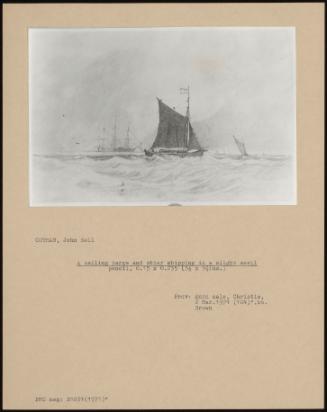 A Sailing Barge And Other Shipping In A Slight Swell