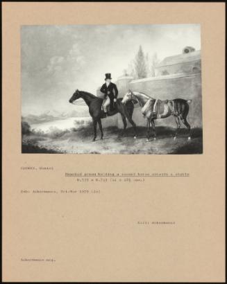 Mounted Groom Holding A Second Horse Outside A Stable