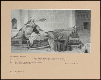 An Eastern Lady Reclining On A Couch