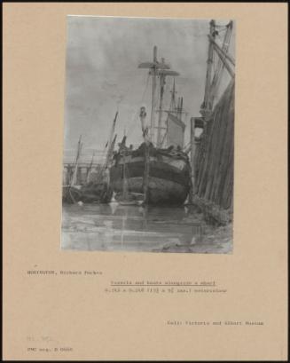 Vessels And Boats Alongside A Wharf