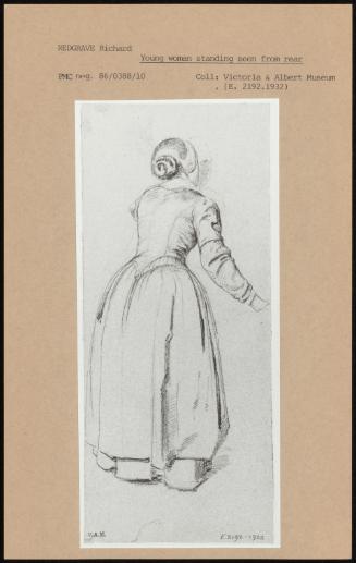 Young Woman Standing Seen From Rear