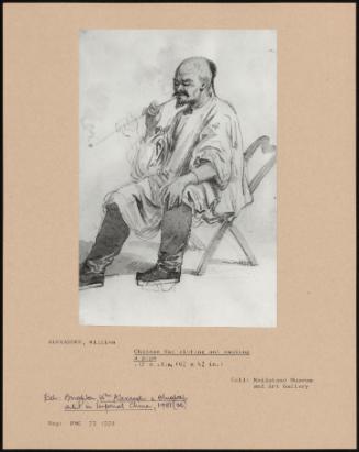 Chinese Man Sitting And Smoking
