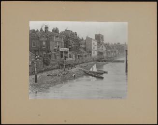 A Thames View With Rowing Boats & Barges On The Shore, Showing The Adam & Eve