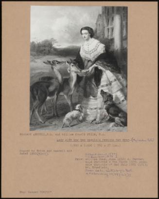 Lady With Her Two Spaniels Feeding Two Deer
