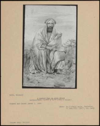 A Seated Man In Arab Dress