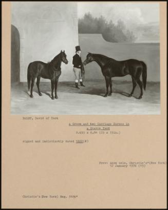 A Groom And Two Carriage Horses In A Stable Yard