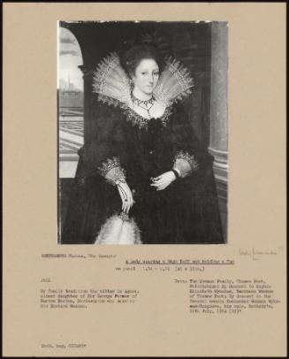 A Lady Wearing A High Ruff And Holding A Fan