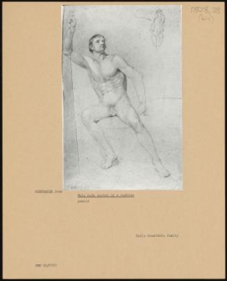 Male Nude Seated on a Cushion