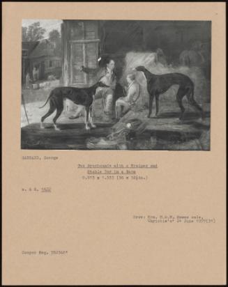 Two Greyhounds With A Trainer And Stable Boy In A Barn