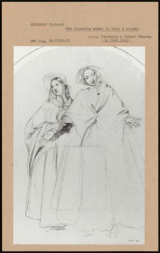 Two Standing Women In Hats & Cloaks