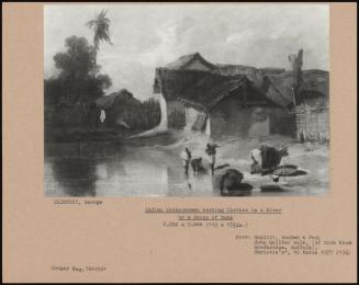 Indian Washerwomen Washing Clothes In A River By A Group Of Huts