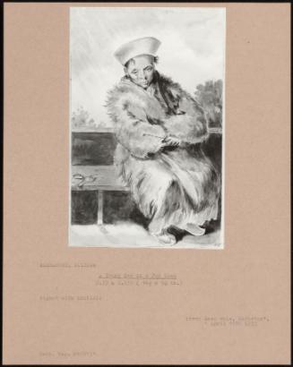 A Young Boy In A Fur Coat